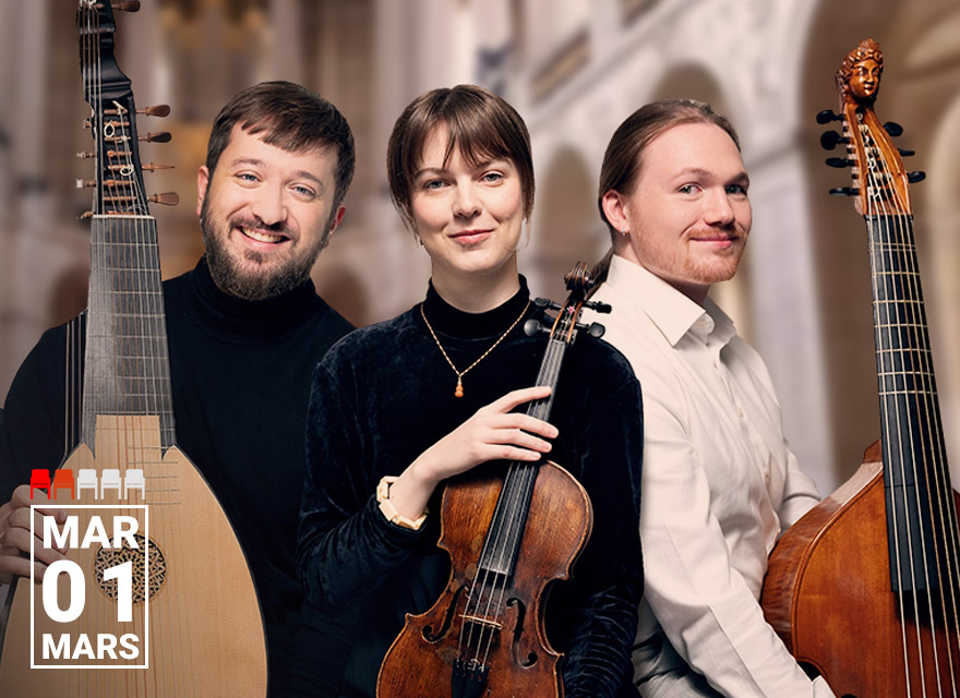 Three musicians pose together with their instruments in an elegant indoor setting. From left to right, a smiling man holds a lute, a woman with a violin cradles it gently, and a man in a white shirt rests beside a viola da gamba. The background features blurred classical architecture. The text 'MAR 01 MARS' appears in the bottom left corner.